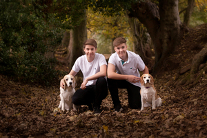 Family portraits created including dogs are a speciality by pet portrait photographer Christine Burke who is based in the village of Bishops Tachbrook near Leamington Spa in Warwickshire. 
