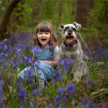 Outdoor lifestyle portraiture in amongst bluebells. Such a wonderful portrait session, so much giggling and laughter was had by all and an absolute joy to see the images displayed as samples by photographer Christine Burke.
